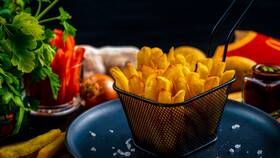 Вес картофеля фри в McDonald's в Тогас